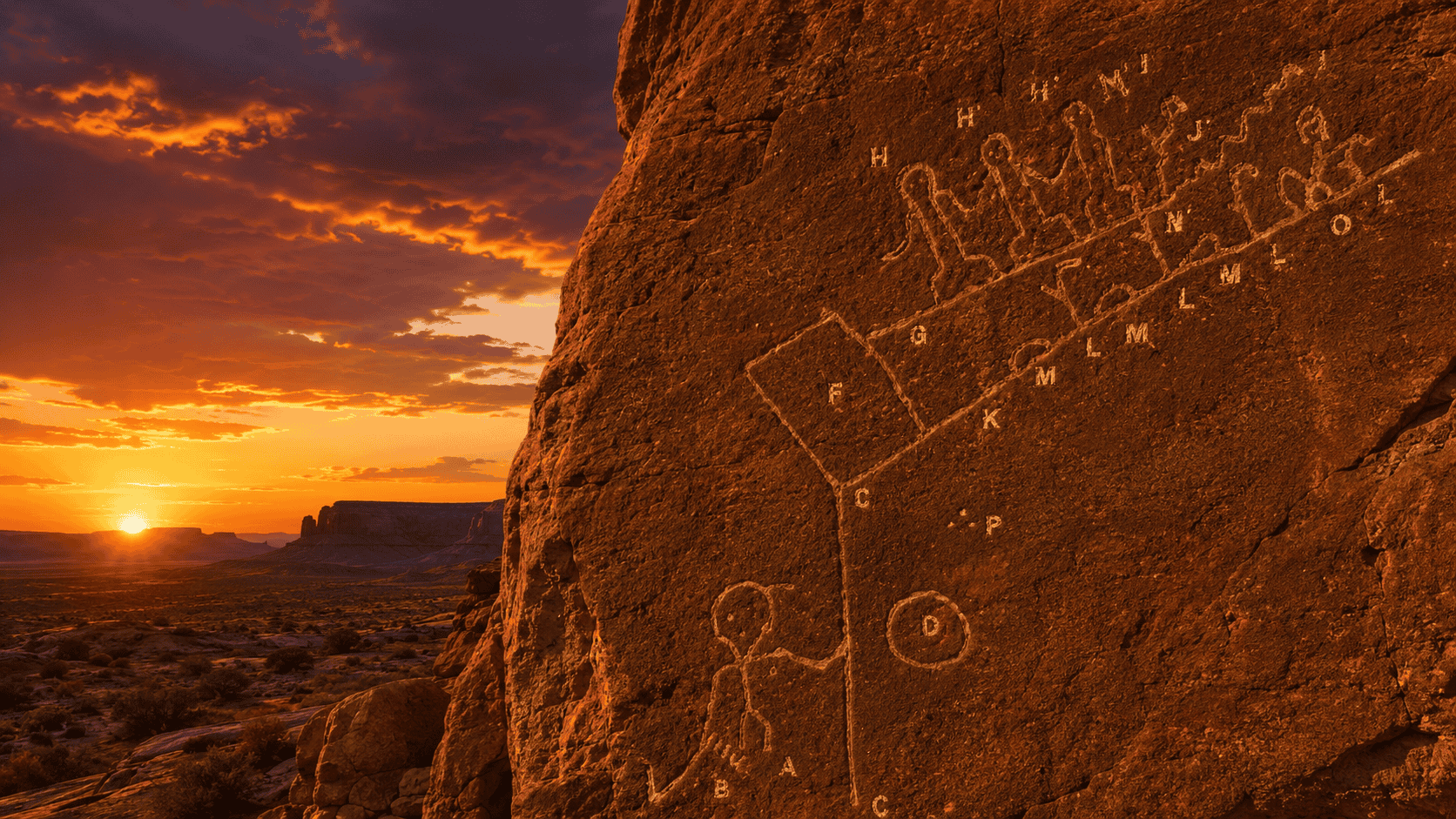 Hopi Prophecy Rock: ancient petroglyph carved into red sandstone mesa in northern Arizona showing two diverging paths of human destiny, teacher figure, and warning preserved by the Hopi for centuries